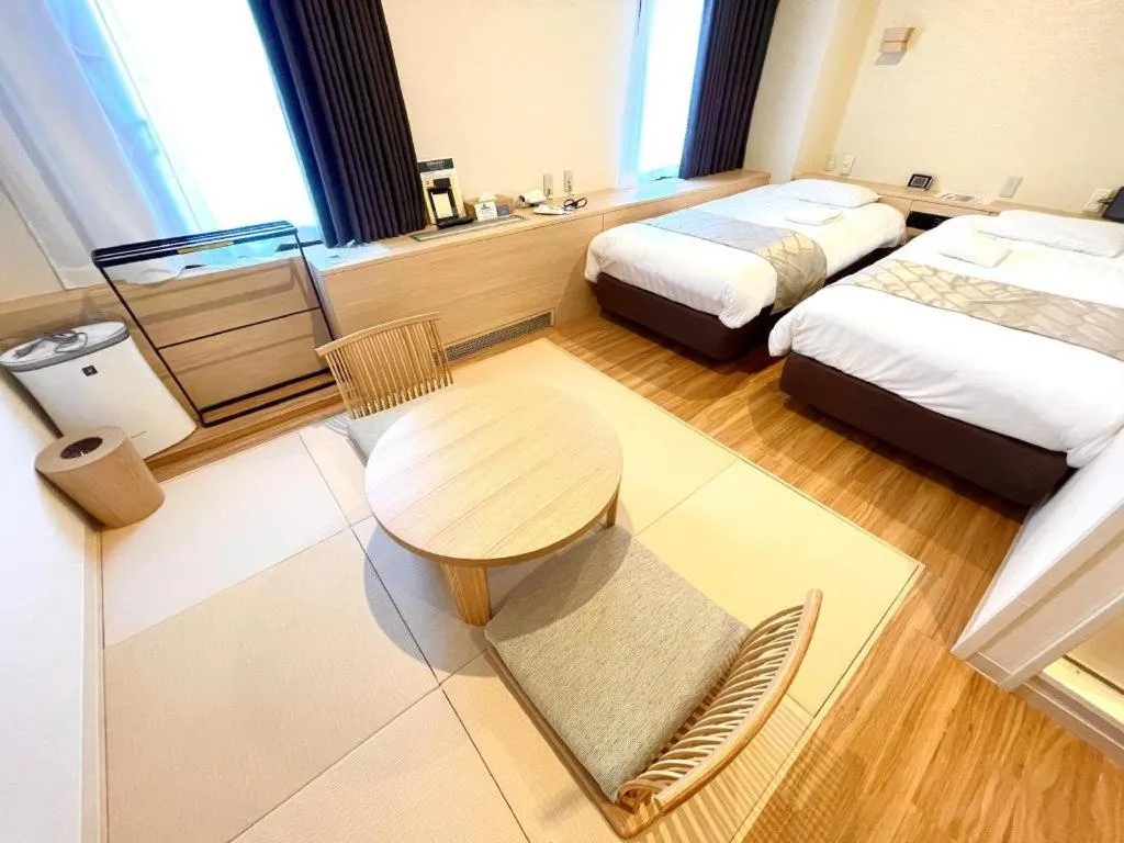 Bed in Hotel Suncity Ikebukuro