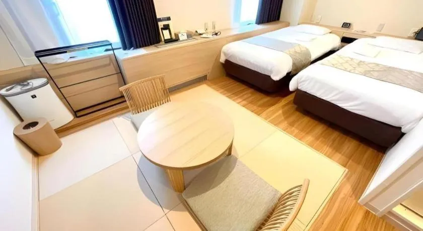 Bed in Hotel Suncity Ikebukuro