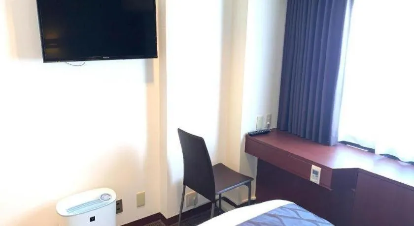 Bed in Hotel Suncity Ikebukuro