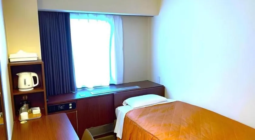 Bed in Hotel Suncity Ikebukuro