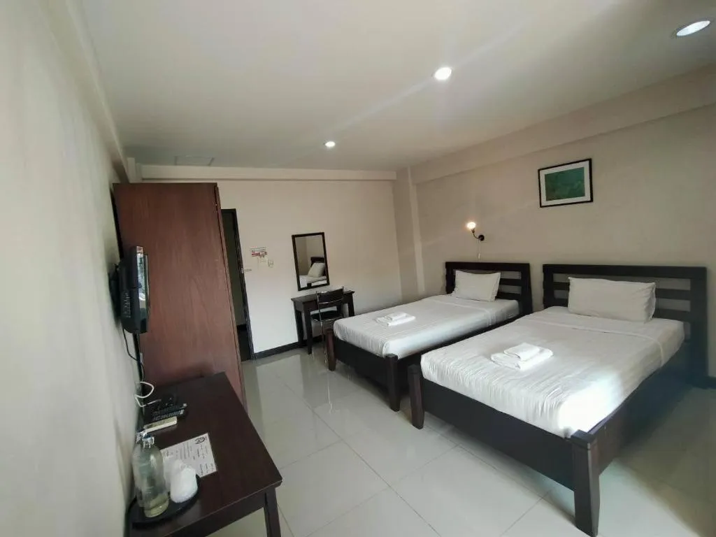 Bed in Home Place Lopburi Hotel
