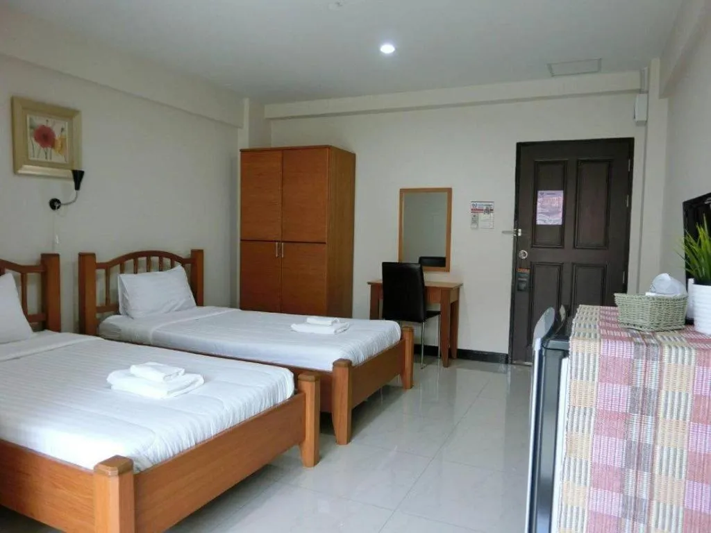 Bed in Home Place Lopburi Hotel