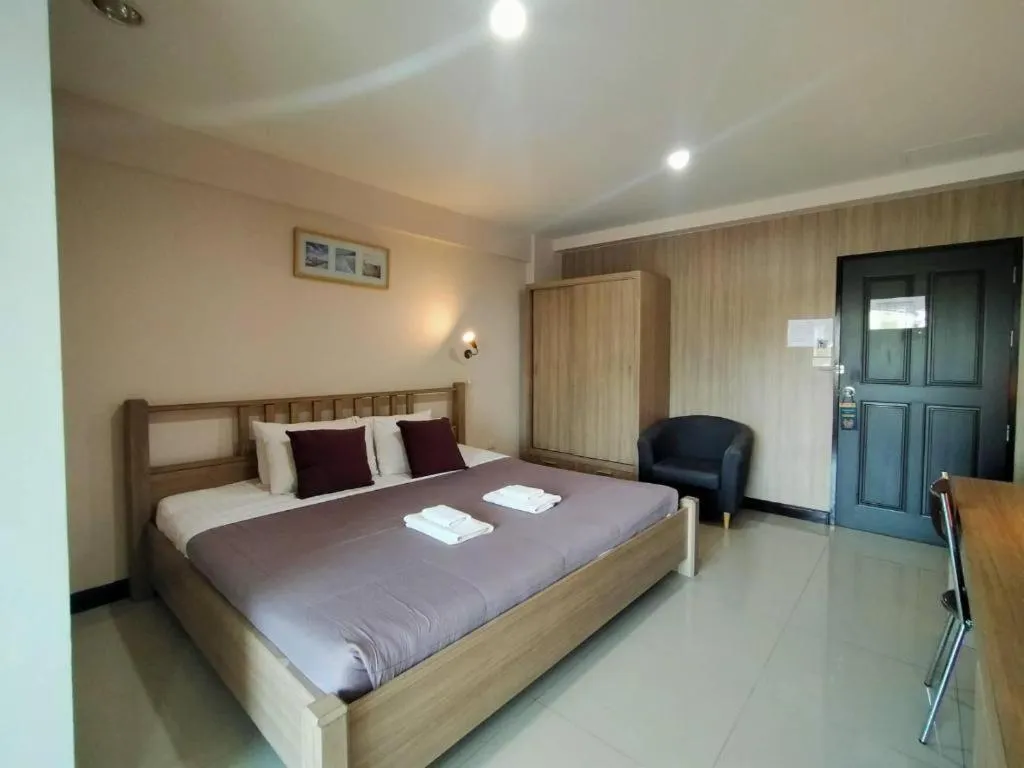 Bed in Home Place Lopburi Hotel