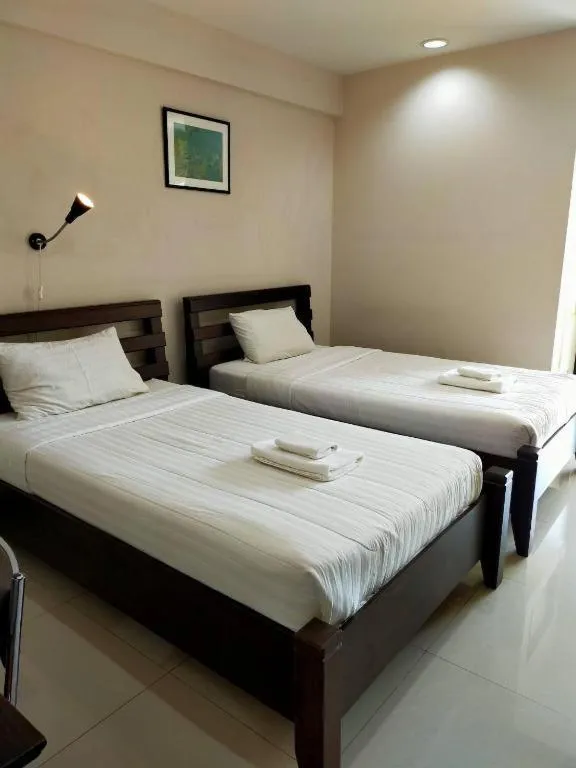 Bed in Home Place Lopburi Hotel