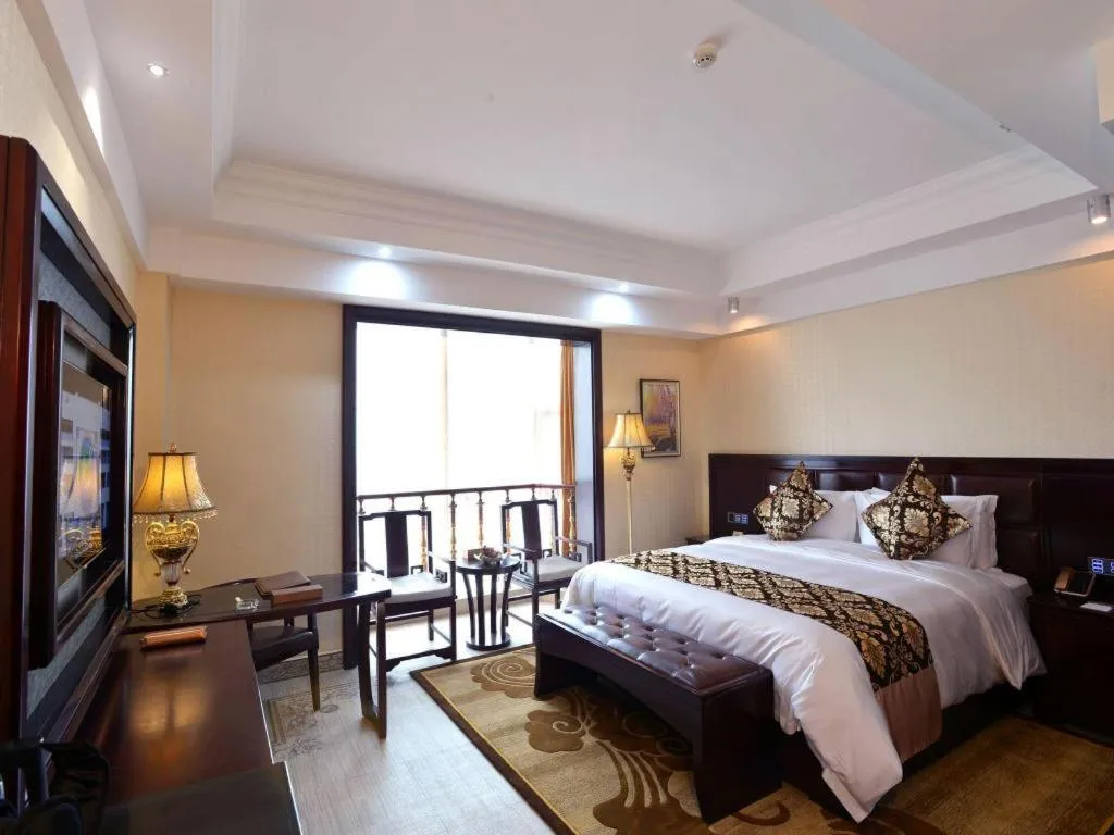 Bed in Wanjiale International Hotel