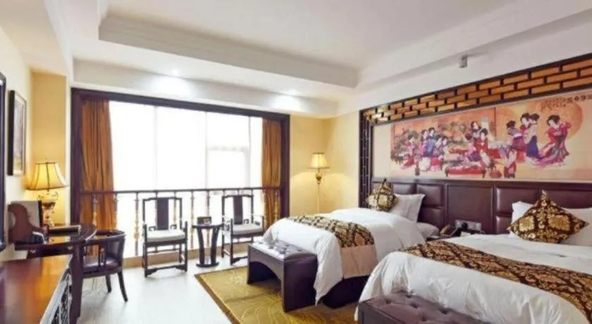 Bed in Wanjiale International Hotel