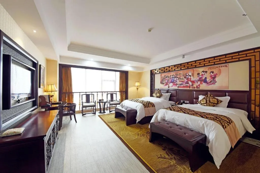 Bed in Wanjiale International Hotel