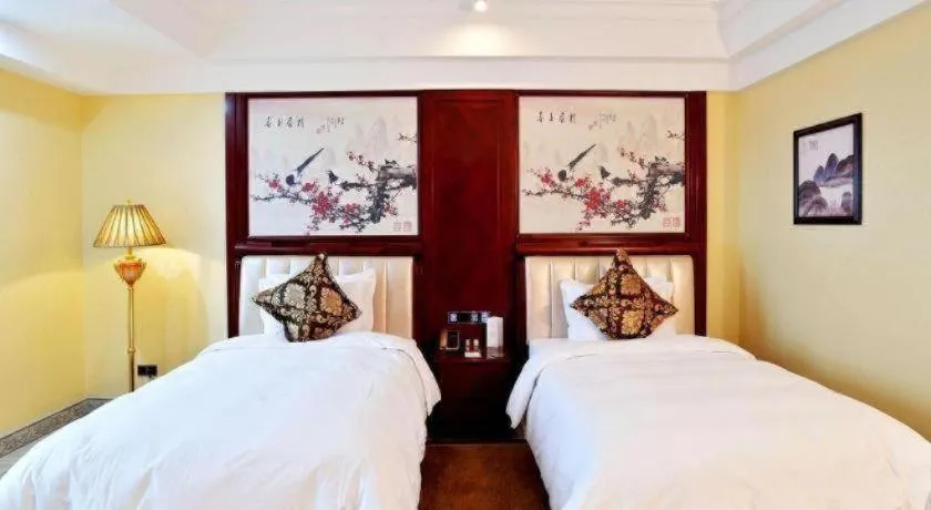 Bed in Wanjiale International Hotel