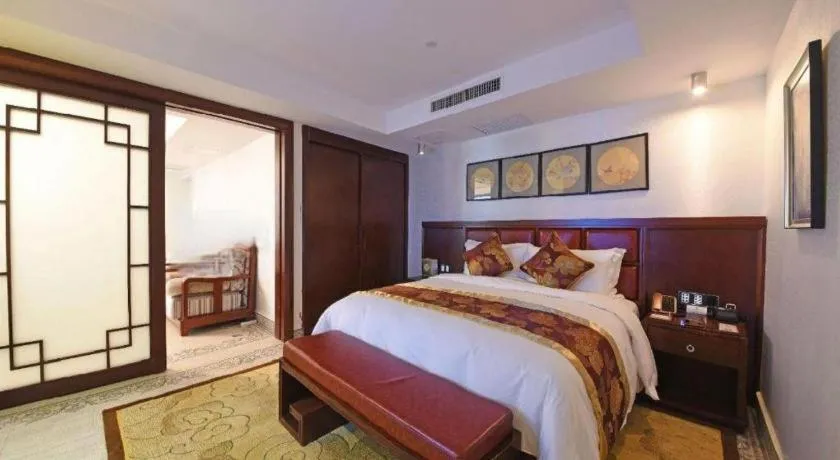 Bed in Wanjiale International Hotel