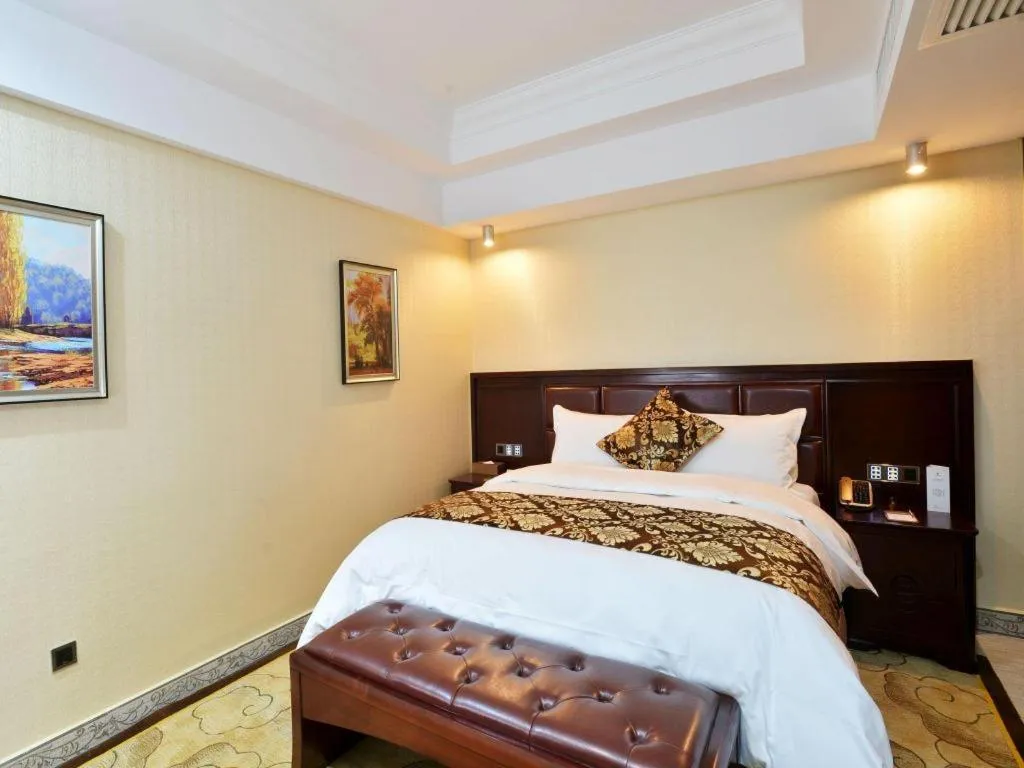 Bed in Wanjiale International Hotel