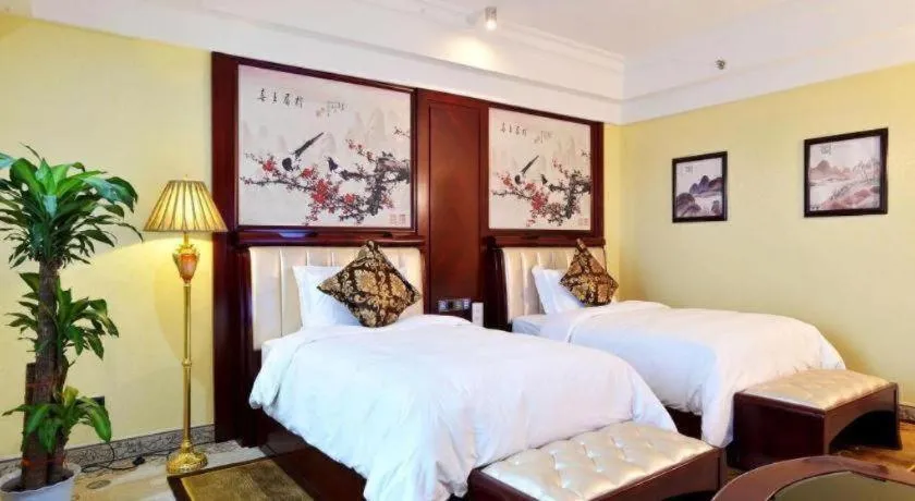 Bed in Wanjiale International Hotel
