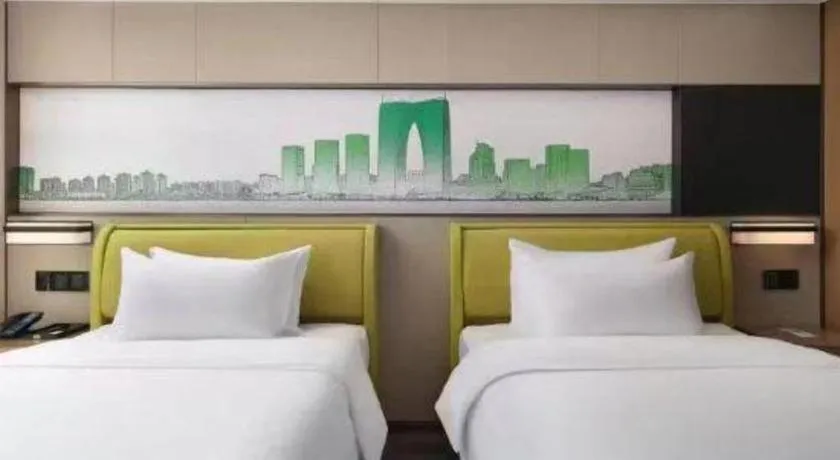 Bed in Hampton by Hilton Suzhou XiangCheng