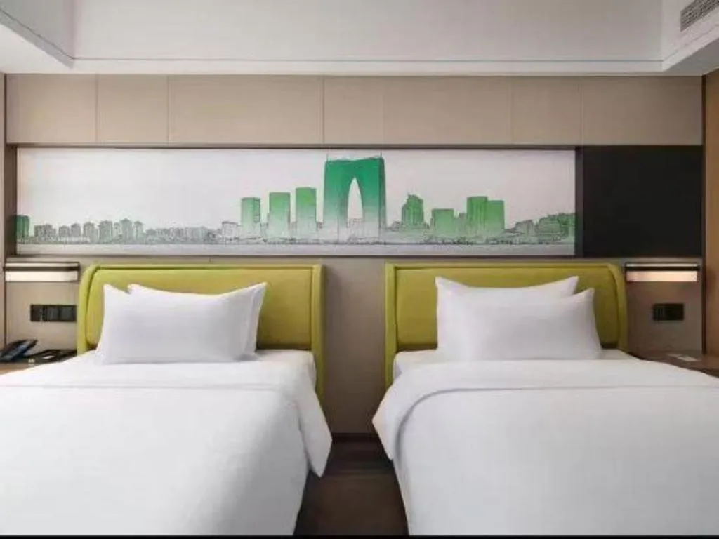 Bed in Hampton by Hilton Suzhou XiangCheng