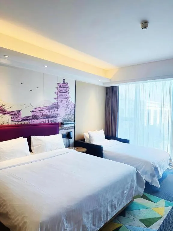 Bed in Hampton by Hilton Suzhou XiangCheng