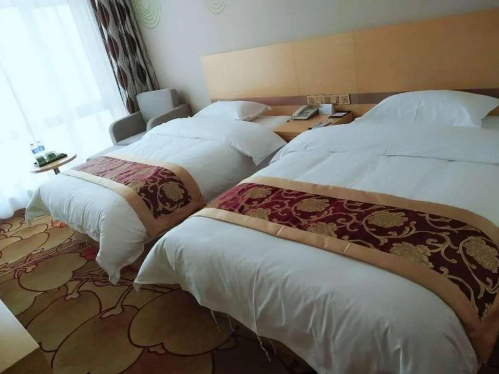 Bed in GreenTree Inn Linxia Niujinhe Avenue Express Hotel