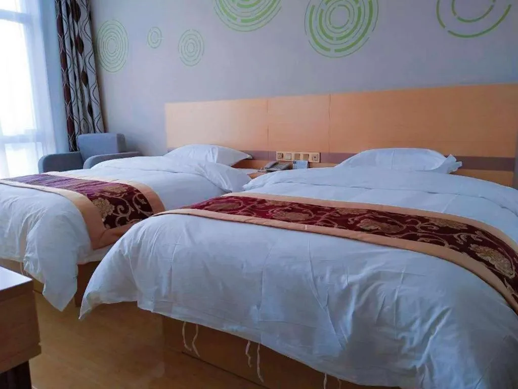 Bed in GreenTree Inn Linxia Niujinhe Avenue Express Hotel