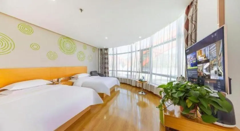 Bed in GreenTree Inn Linxia Niujinhe Avenue Express Hotel