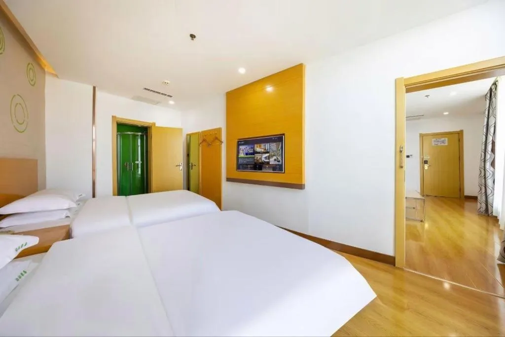 Bed in GreenTree Inn Linxia Niujinhe Avenue Express Hotel