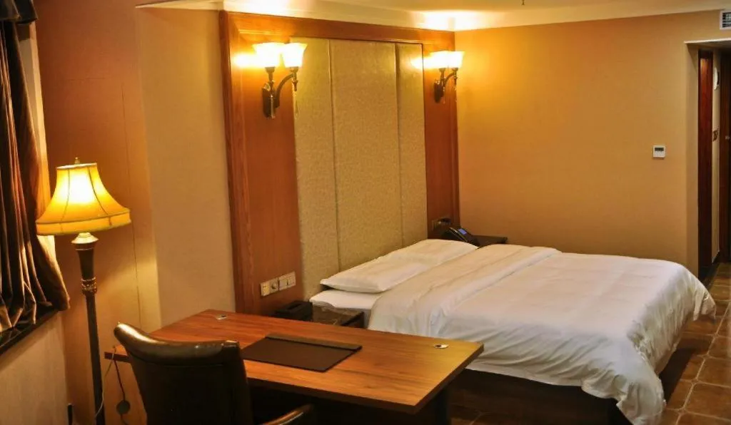 Bed in LINCOLN CARNIVAL HOTEL