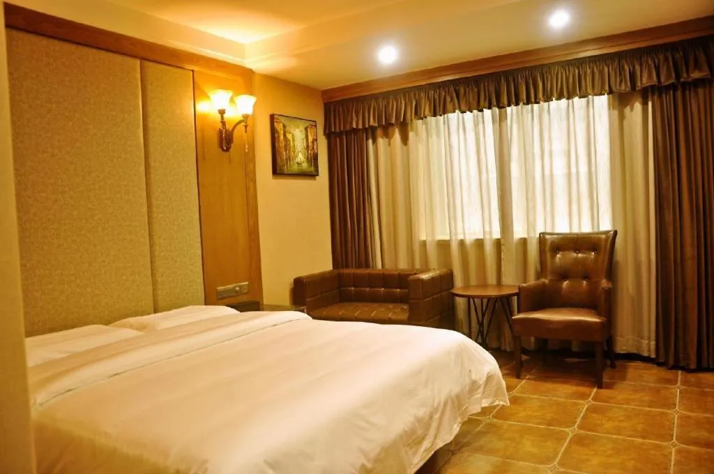 Bed in LINCOLN CARNIVAL HOTEL