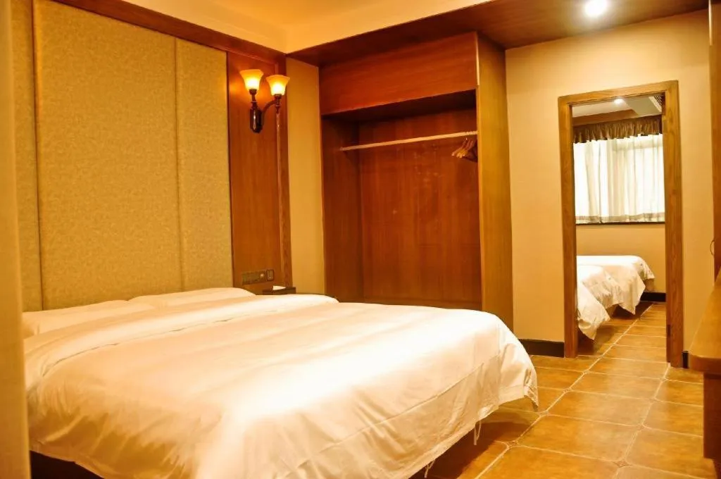 Bed in LINCOLN CARNIVAL HOTEL