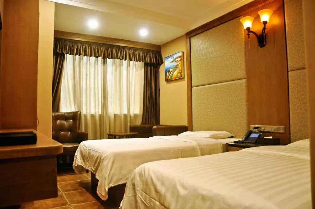 Bed in LINCOLN CARNIVAL HOTEL