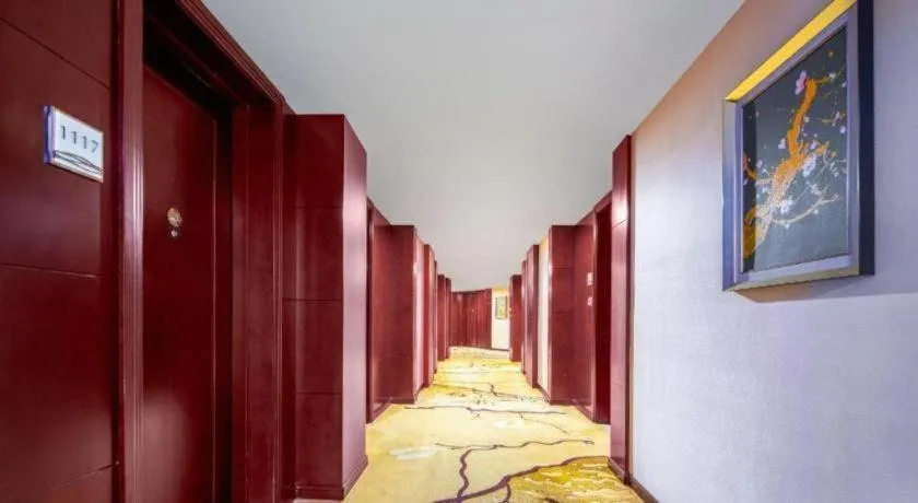 Bed in Taishun Xiangzhou New Century Hotel