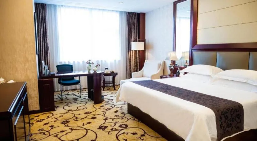 Bed in Taishun Xiangzhou New Century Hotel
