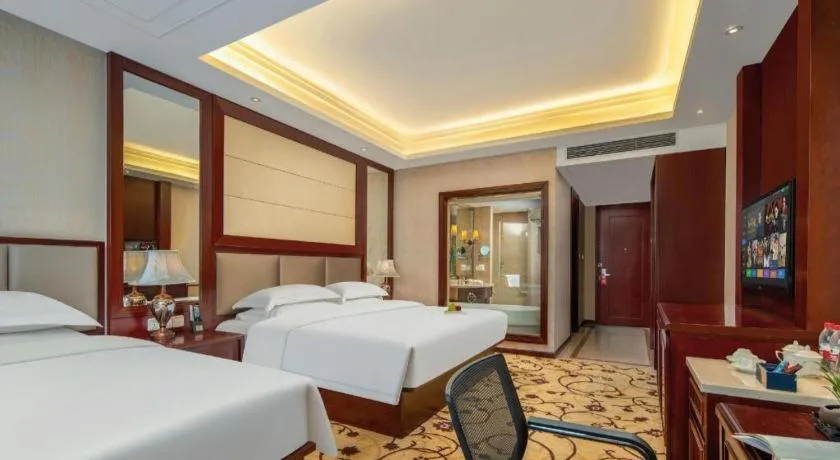 Bed in Taishun Xiangzhou New Century Hotel