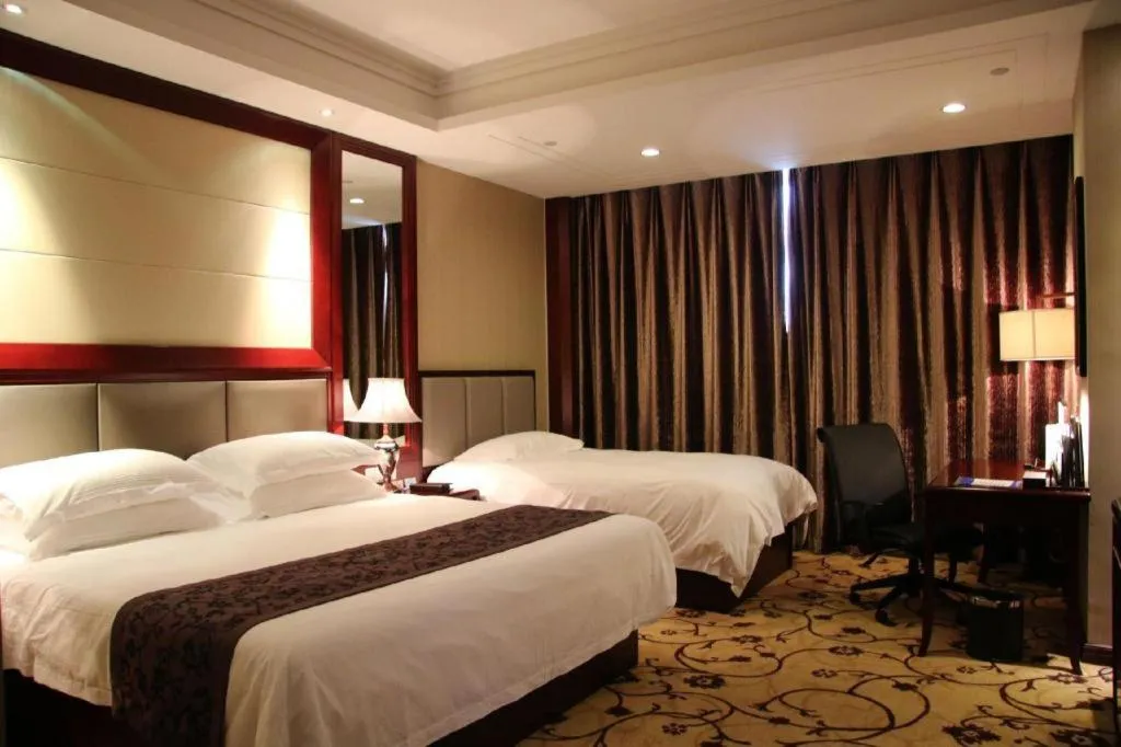 Bed in Taishun Xiangzhou New Century Hotel