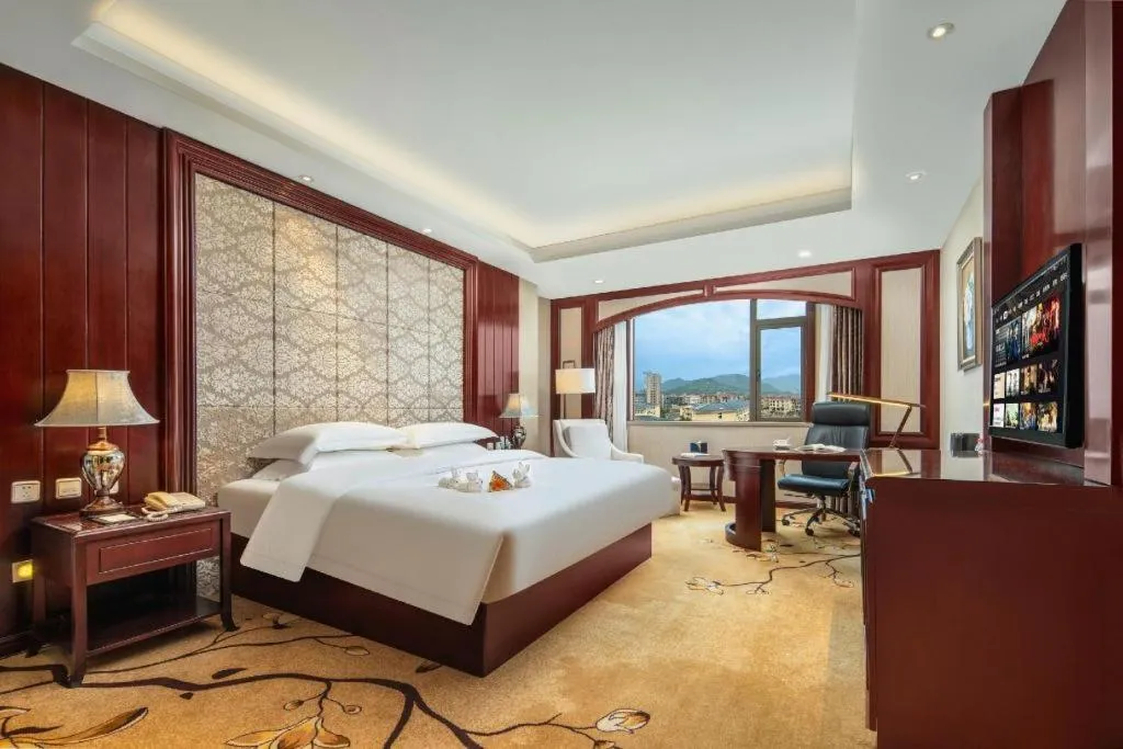 Bed in Taishun Xiangzhou New Century Hotel