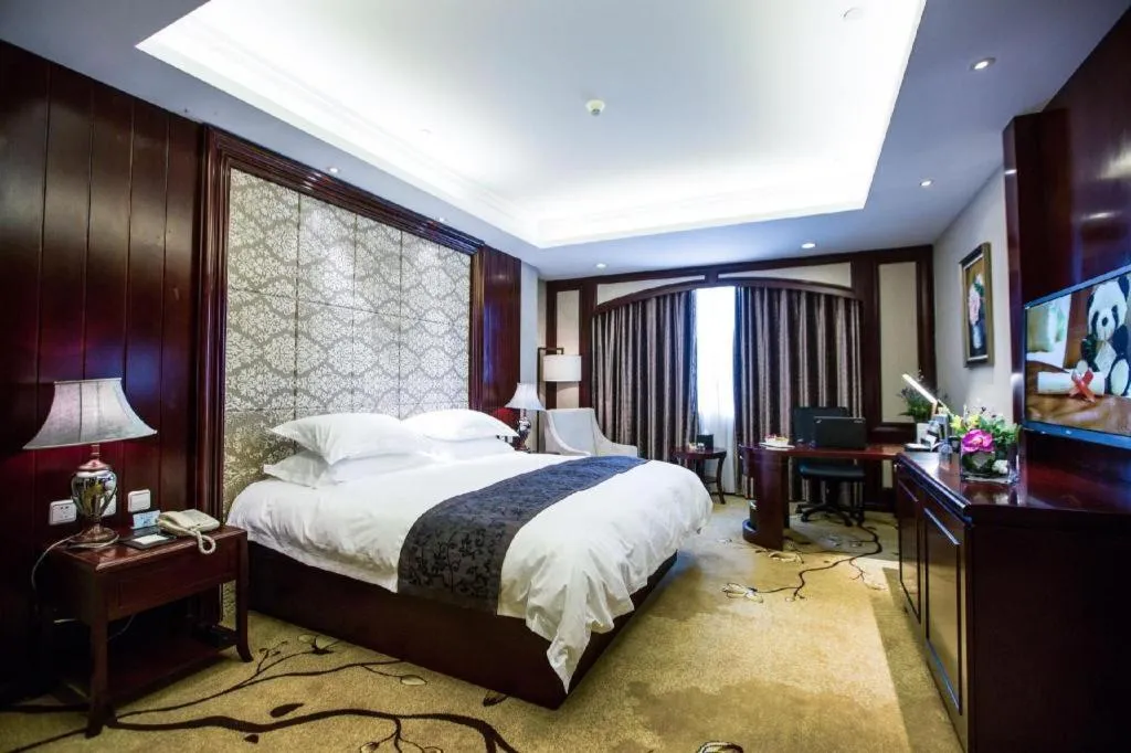 Bed in Taishun Xiangzhou New Century Hotel