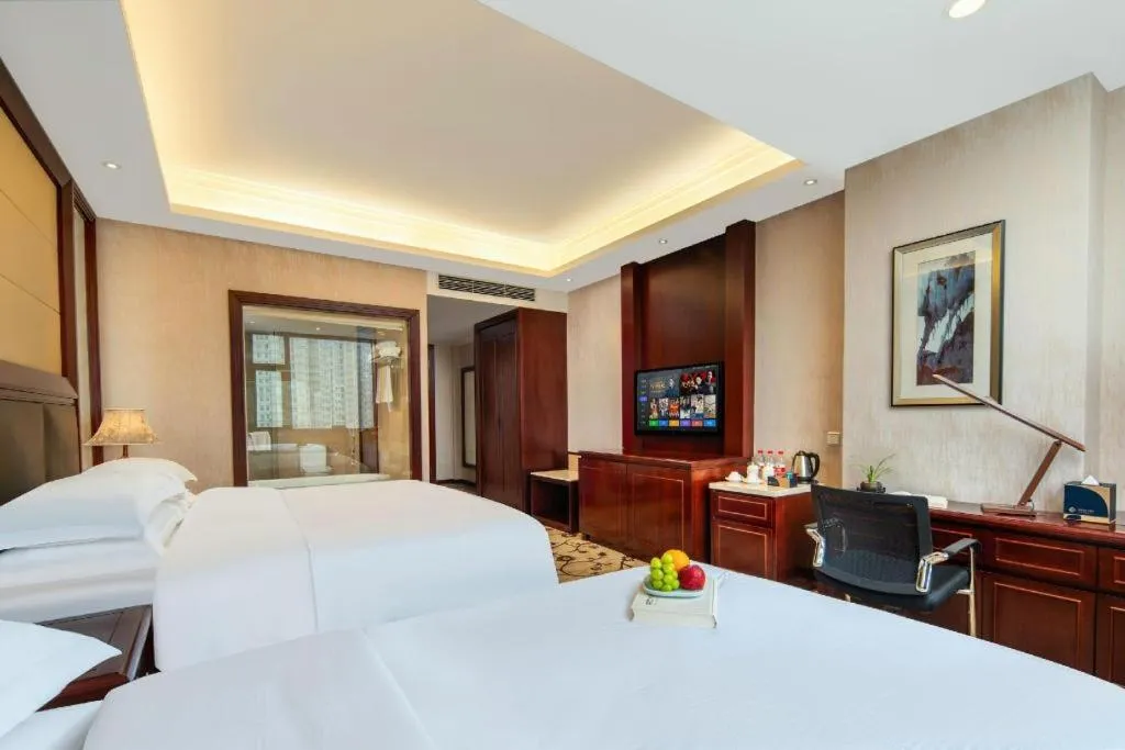 Bed in Taishun Xiangzhou New Century Hotel