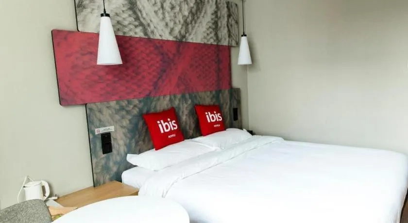 Bed in Ibis Xinzhou Qiyi RD