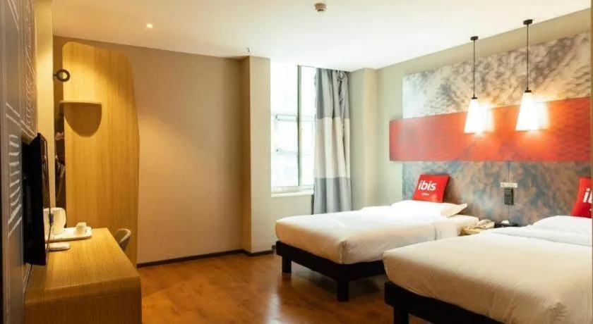 Bed in Ibis Xinzhou Qiyi RD