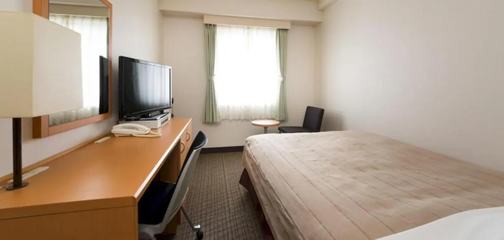 Bed in Sapporo Hotel Yamachi