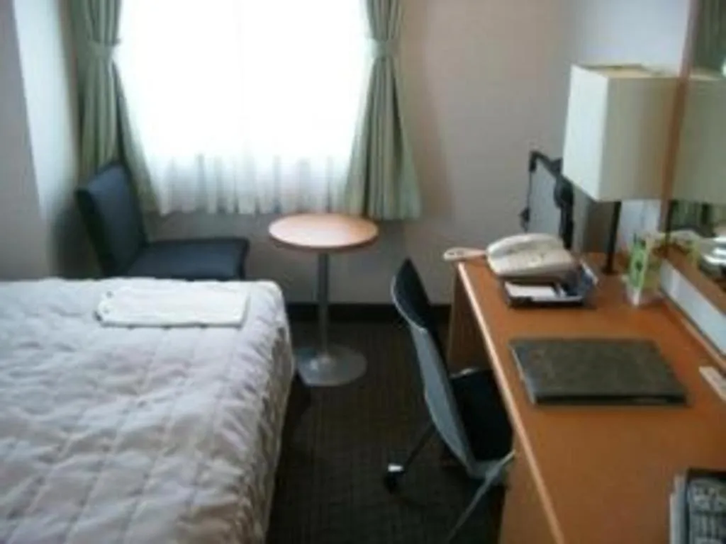 Bed in Sapporo Hotel Yamachi