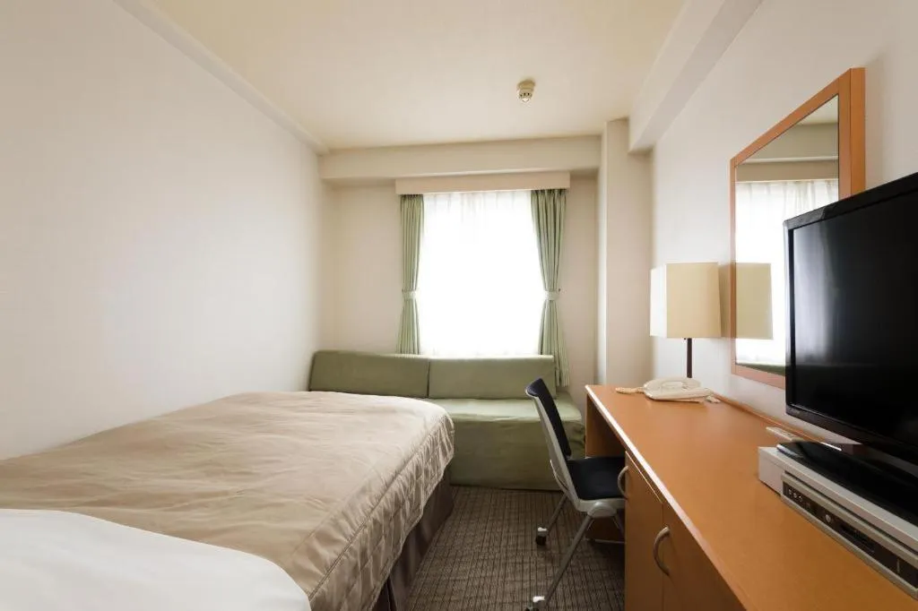 Bed in Sapporo Hotel Yamachi