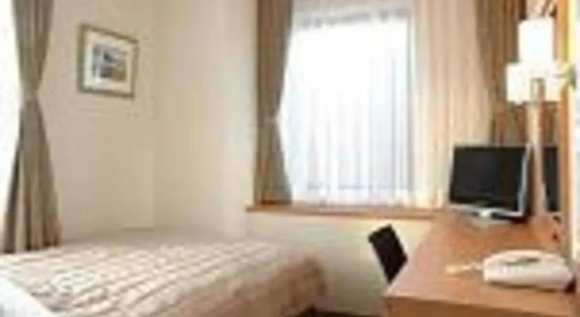 Bed in Sapporo Hotel Yamachi