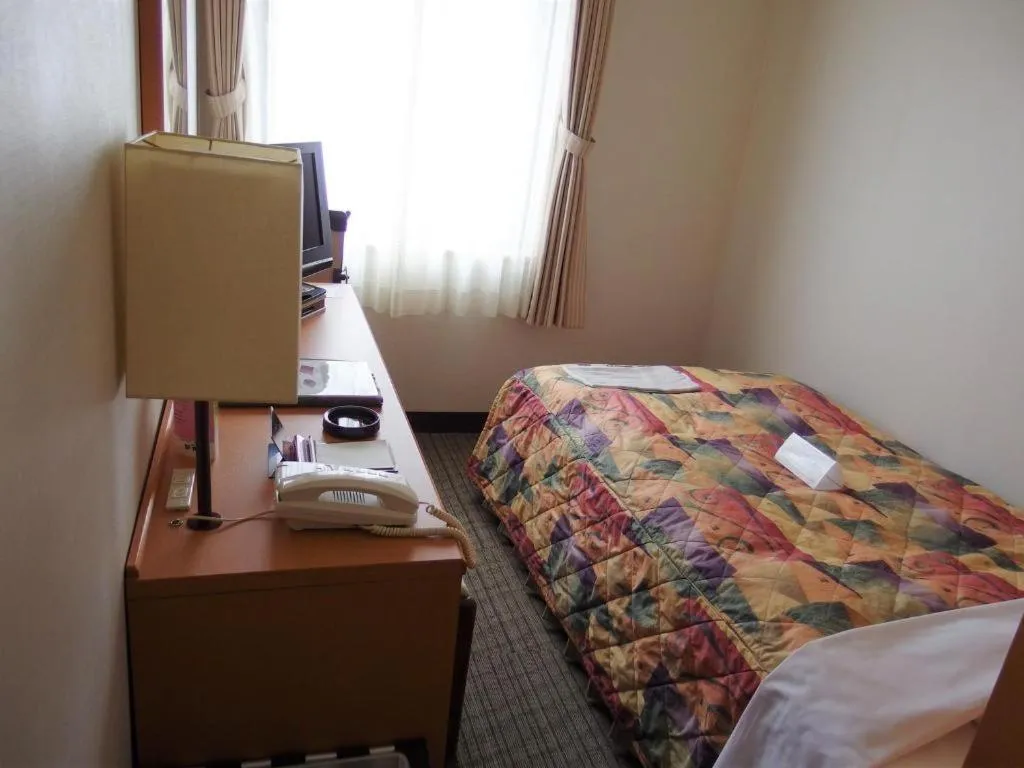 Bed in Sapporo Hotel Yamachi