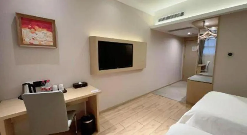 Bed in Metropolo Hotel Qingdao Wusi Square Xiaomaidao