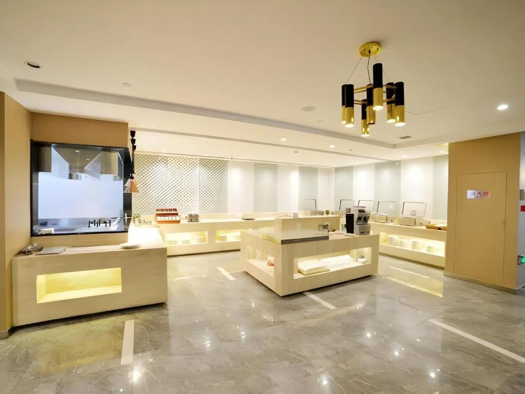 Bed in Metropolo Hotel Qingdao Wusi Square Xiaomaidao