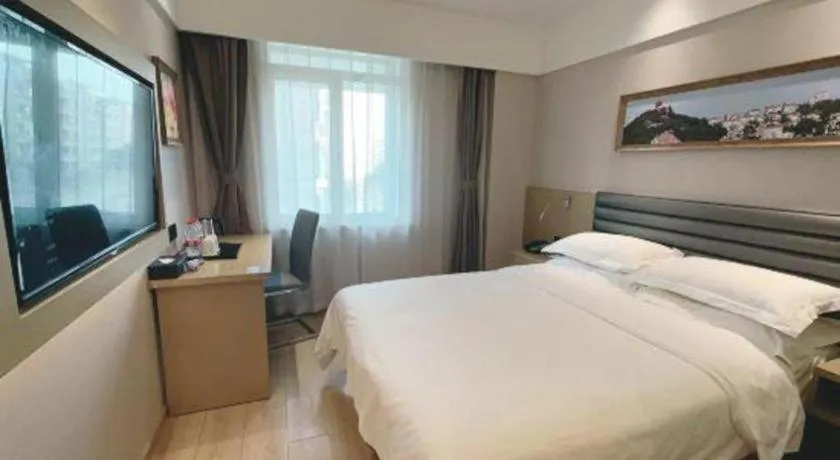 Bed in Metropolo Hotel Qingdao Wusi Square Xiaomaidao