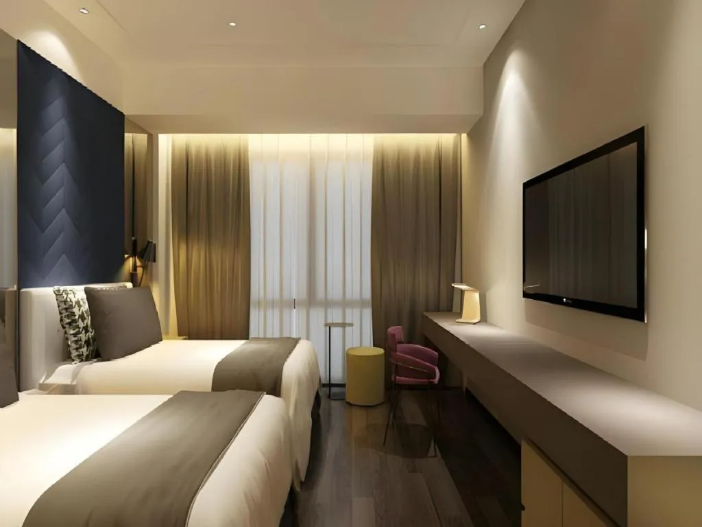 Bed in Metropolo Hotel Qingdao Wusi Square Xiaomaidao