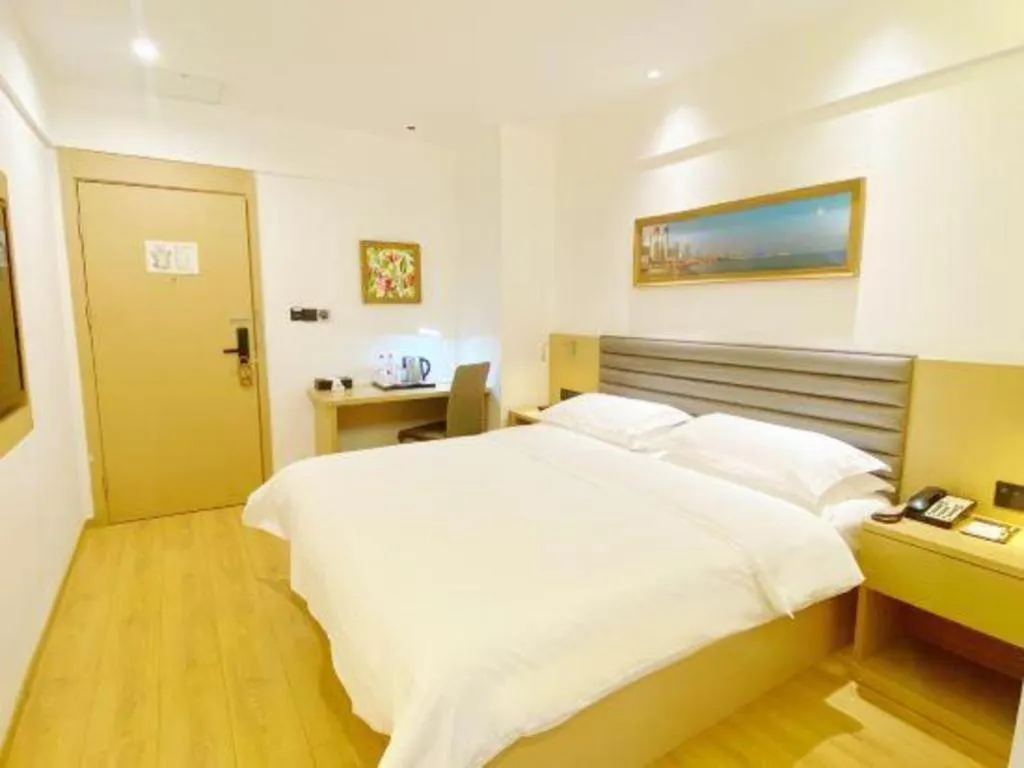 Bed in Metropolo Hotel Qingdao Wusi Square Xiaomaidao