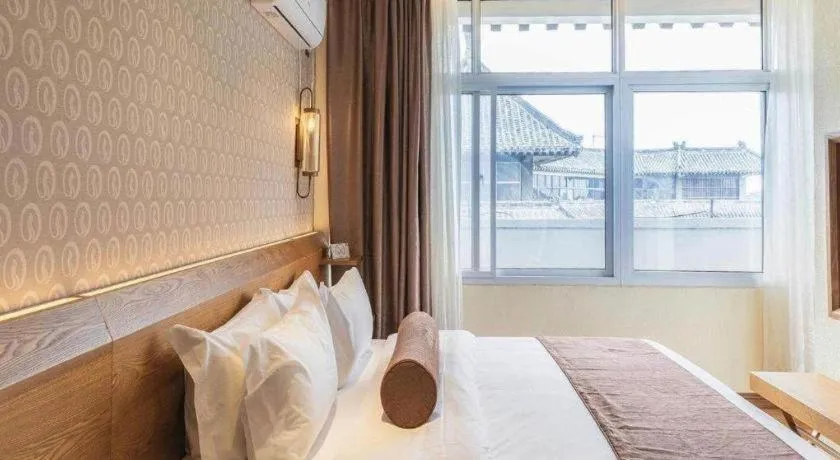 Bed in James Joyce Coffetel Qufu Tourist Center Gulou Street Sankong Scenic Spot