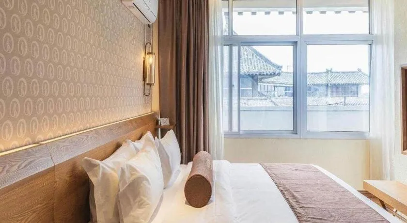 Bed in James Joyce Coffetel Qufu Tourist Center Gulou Street Sankong Scenic Spot