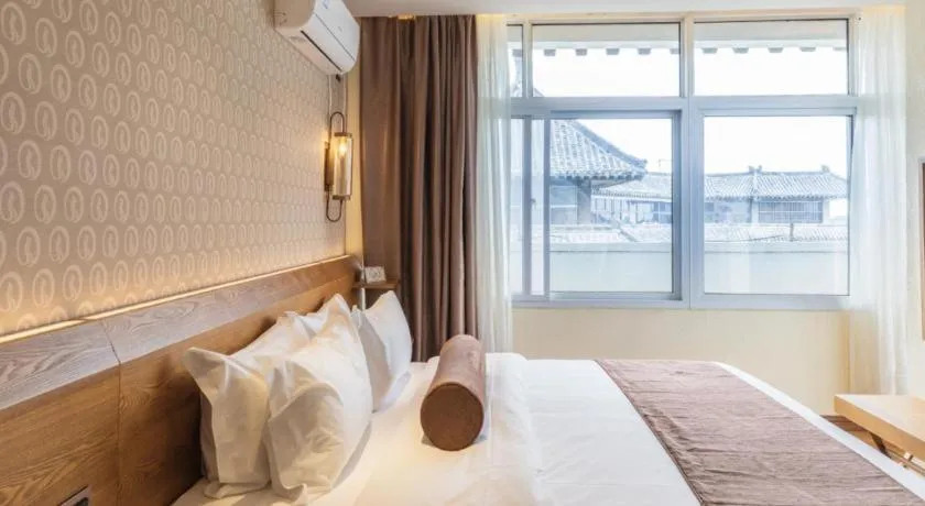 Bed in James Joyce Coffetel Qufu Tourist Center Gulou Street Sankong Scenic Spot