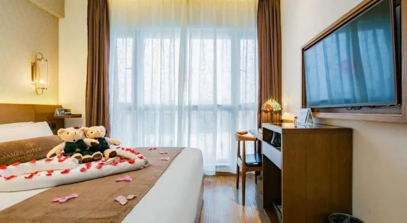 Bed in James Joyce Coffetel Chengdu Jichang Road Shenxianshu