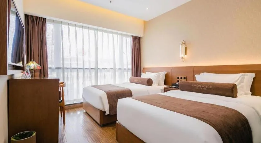 Bed in James Joyce Coffetel Chengdu Jichang Road Shenxianshu